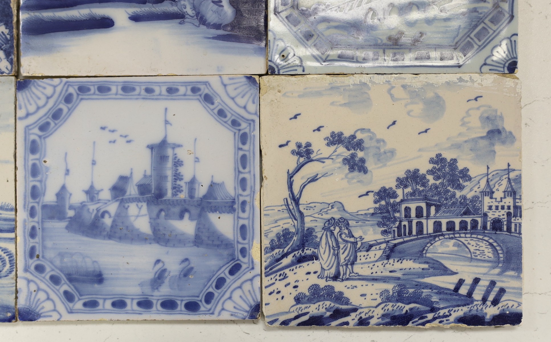 Nine various Delft blue and white landscape or animal tiles, 18th/19th century